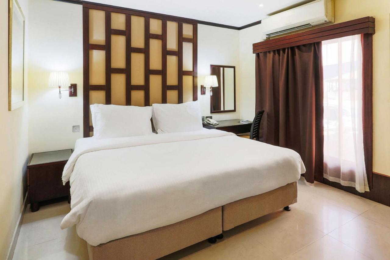 Radisson Blu Resort, Sharjah Eksteriør bilde A bedroom at the hotel
