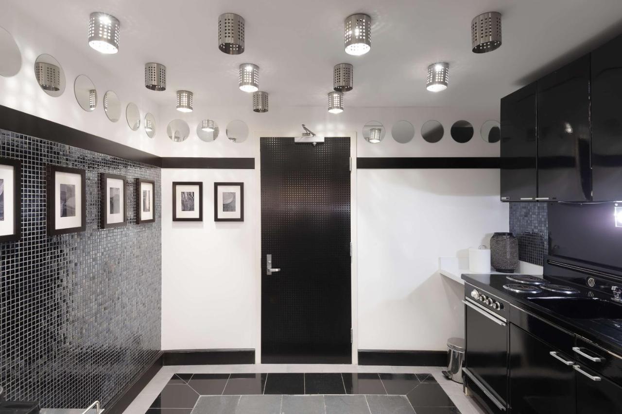 Radisson Blu Resort, Sharjah Eksteriør bilde A kitchen with a concealed door
